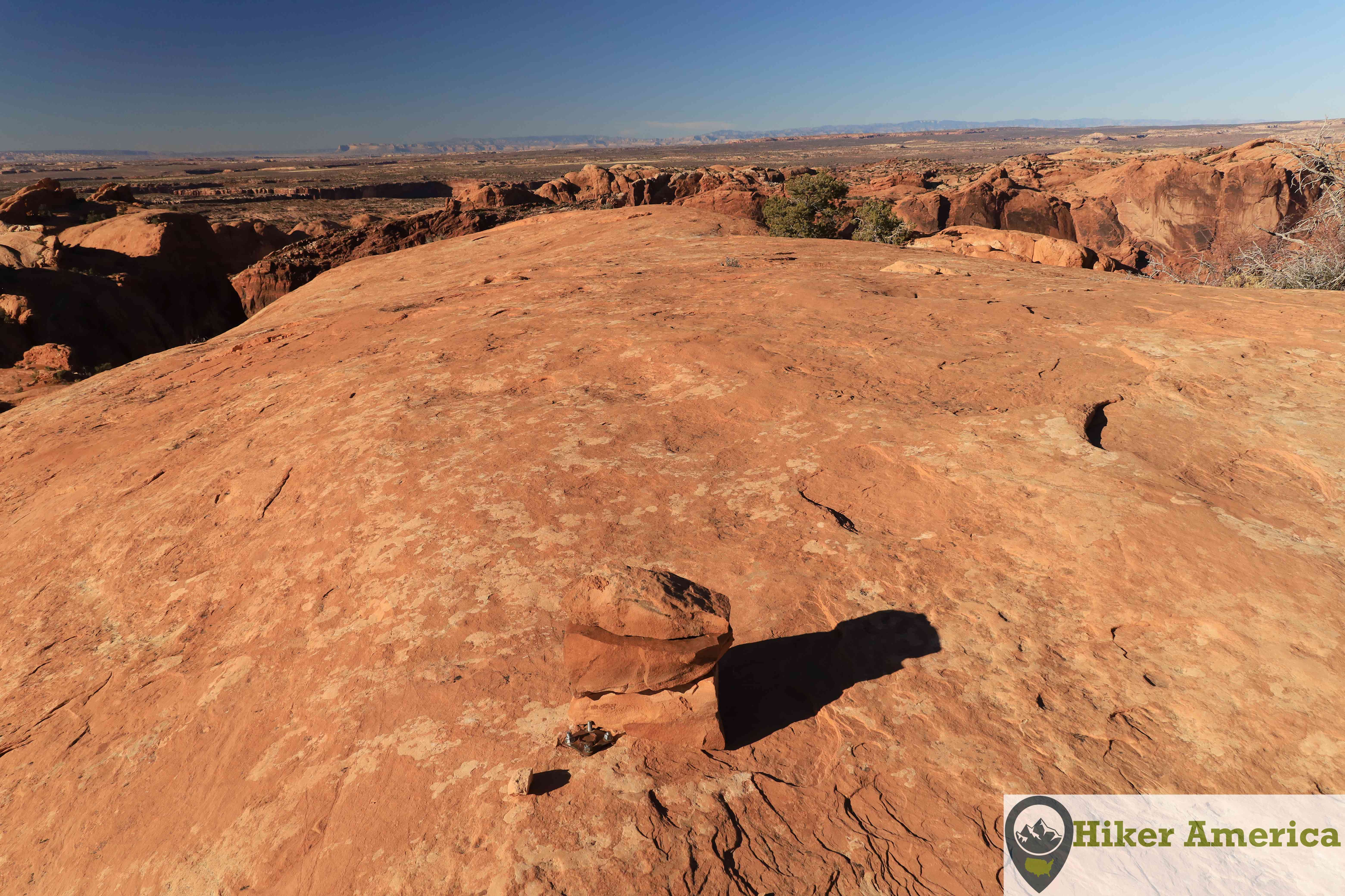 The Upheaval Dome Trail ends on slickrock with stunning views.